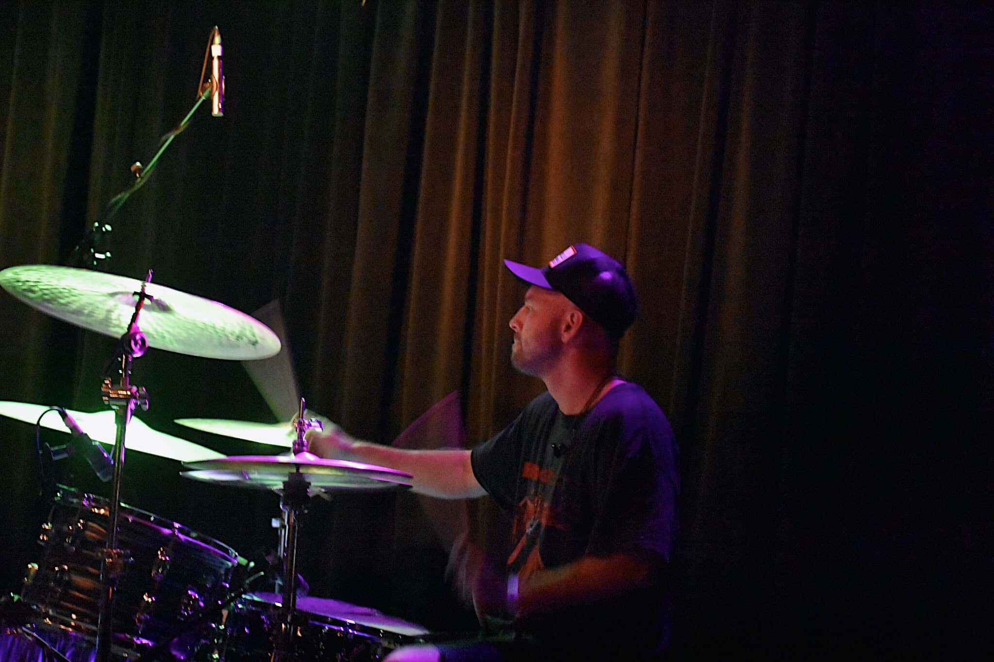 Drummer performing at the High Watt
