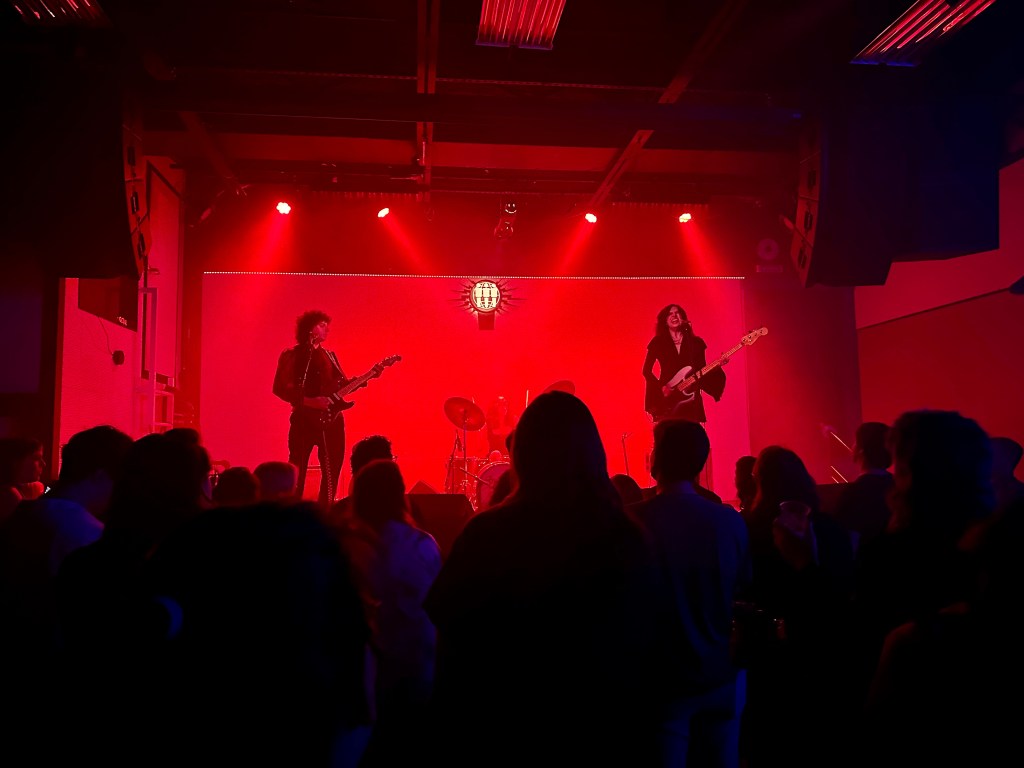 Sunflower Bean playing in front of audience at The Blue Room in Nashville