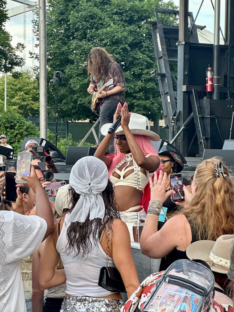 Reyna Roberts interacting with the crowd at CMA Fest 2025