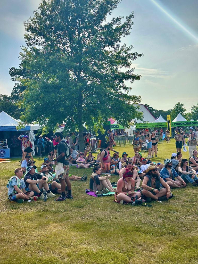 Fans sit in the shade at Bonnaroo 2025