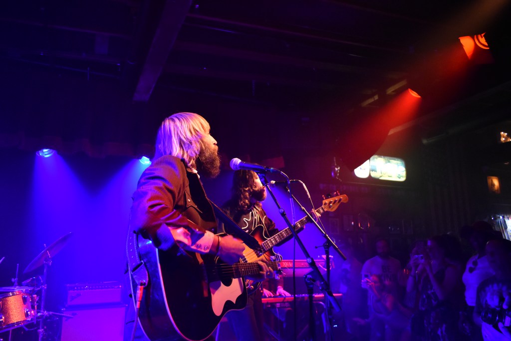 Paul McDonald at the album release show for "So Long To The Darkside" at Skinny Dennis in Nashville with crowd watching