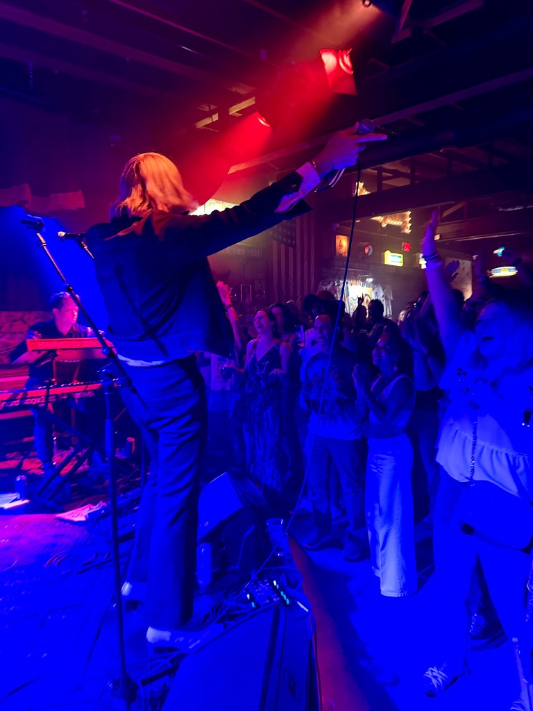 Paul McDonald singer at the album release show for "So Long To The Darkside" at Skinny Dennis in East Nashville with crowd watching