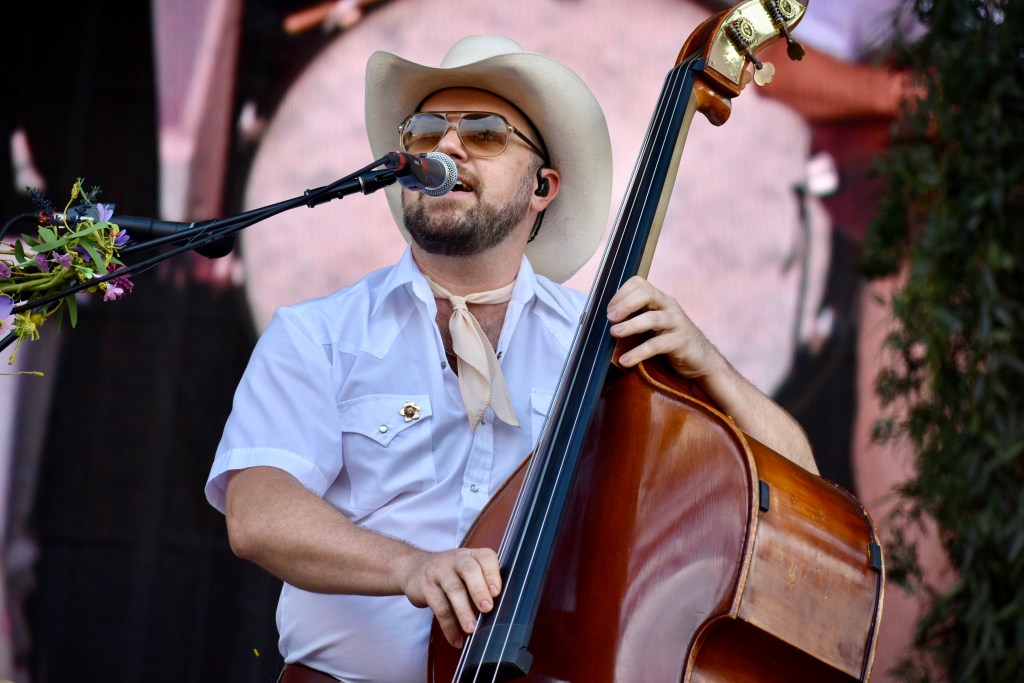 Standup bass player performing with Sierra Ferrell at Hinterland Music Festival 2025