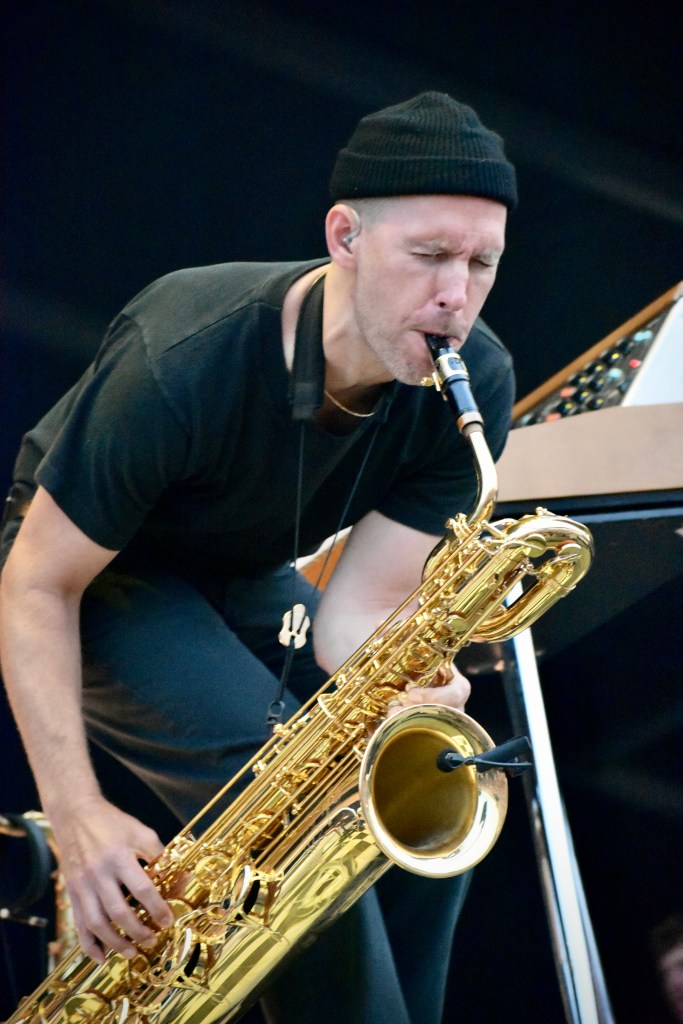Evan Smith of Bleachers playing saxophone at Hinterland Music Festival 2025