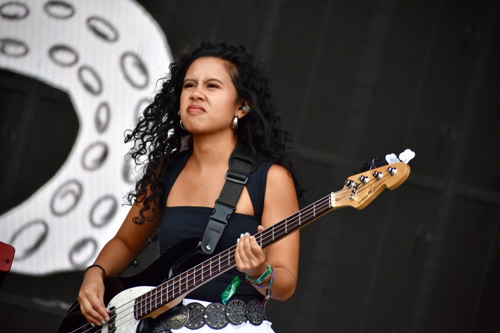 Bass player performing with Gigi Perez at Hinterland 2025