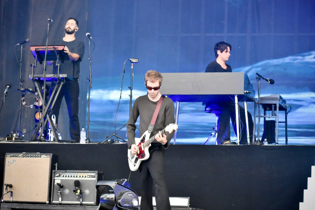 Band members performing at Hinterland Music Festival 2025