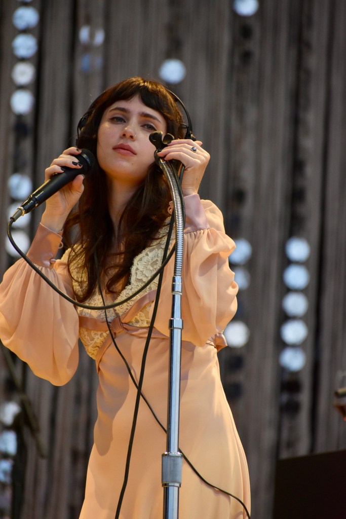 Clairo singing at the 2025 Hinterland Music Festival