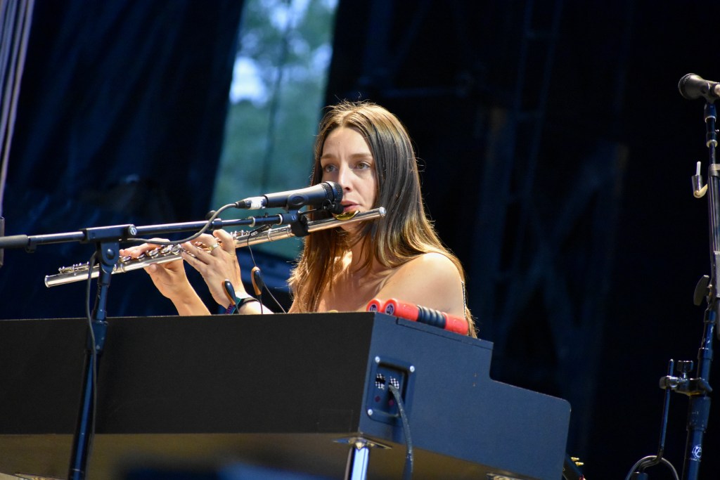 Band member performing with Clairo at 2025 Hinterland Music Festival