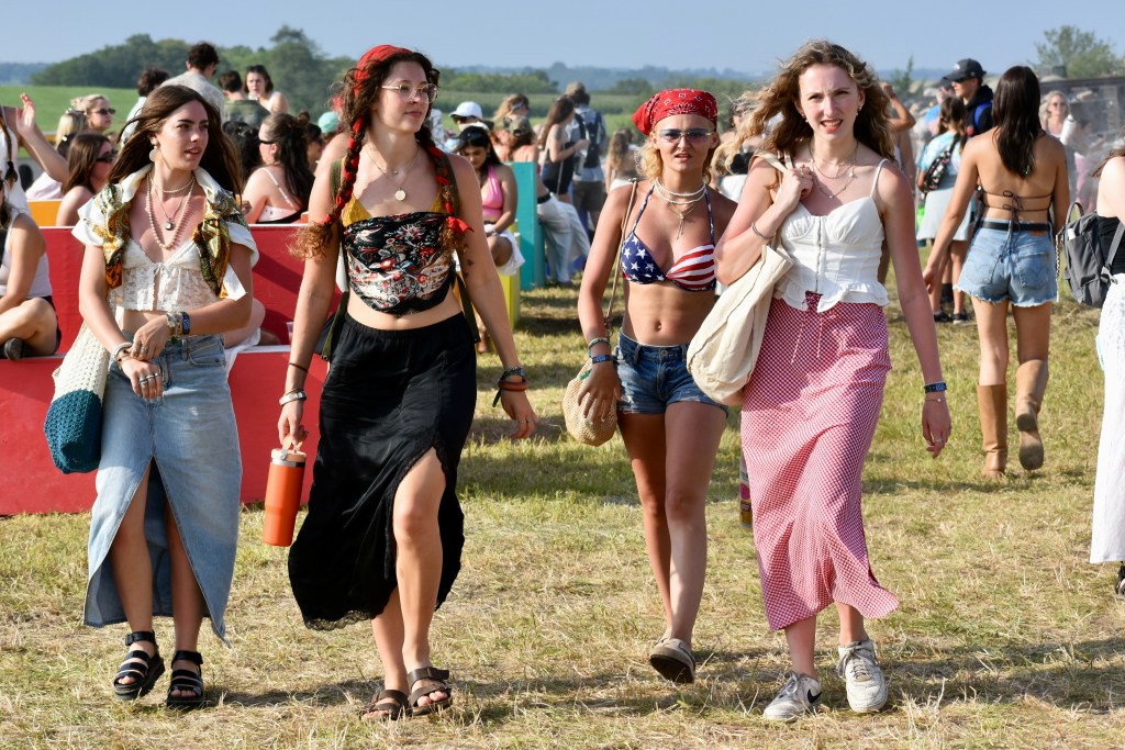 Hinterland Music Festival attendees walking on festival grounds in Saint Charles Iowa