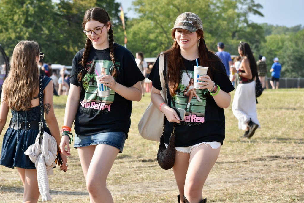Lana Del Rey fans walk the festival grounds at Hinterland Music Festival 2025