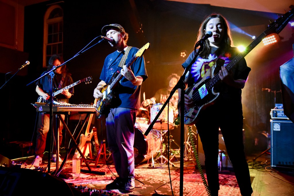 Kenny Becker (vocals/guitar), Andy Polito (drums), Dillon Peralta (guitar), and Tamara Simons (bass) of the band Goon performing at the East Room in Nashville Tennessee
