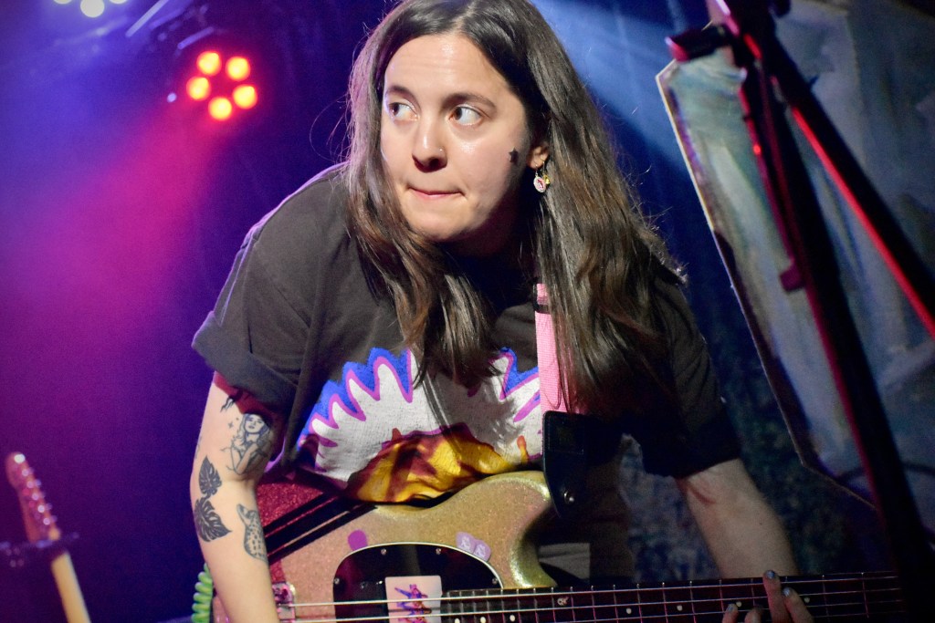 Tamara Simons of the band Goon playing bass at the East Room In Nashville