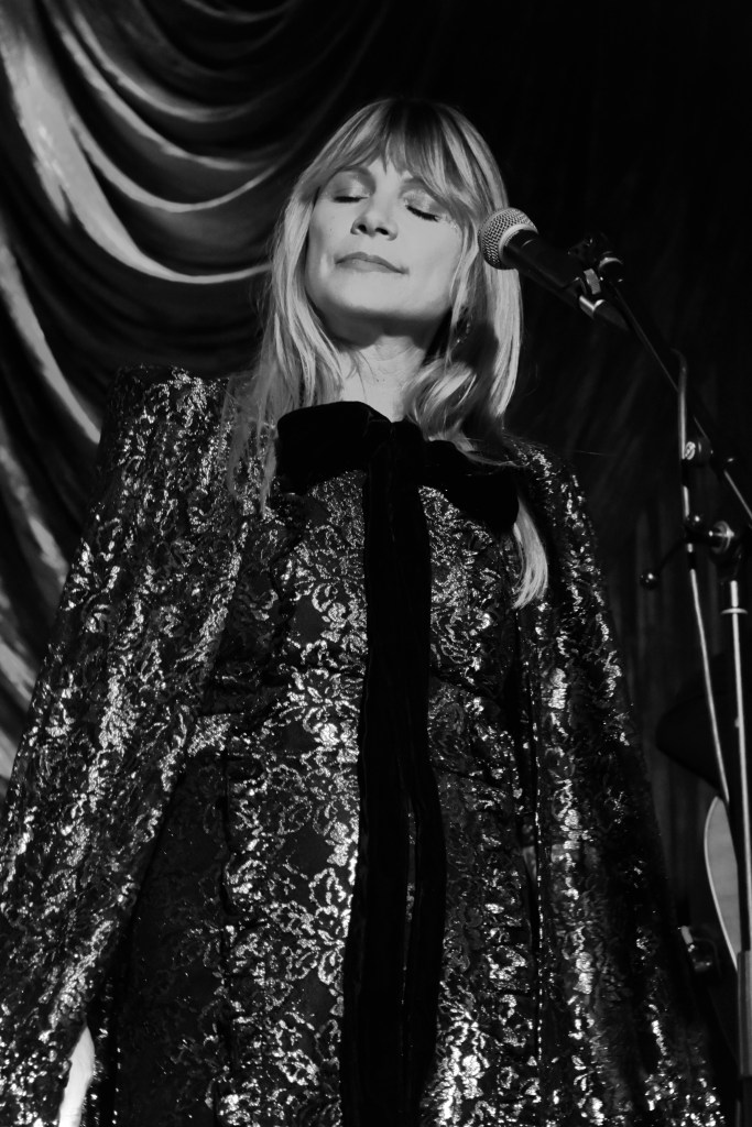 Background singer performing with Kashena Sampson at Eastside Bowl In Nashville Tennessee October 2025