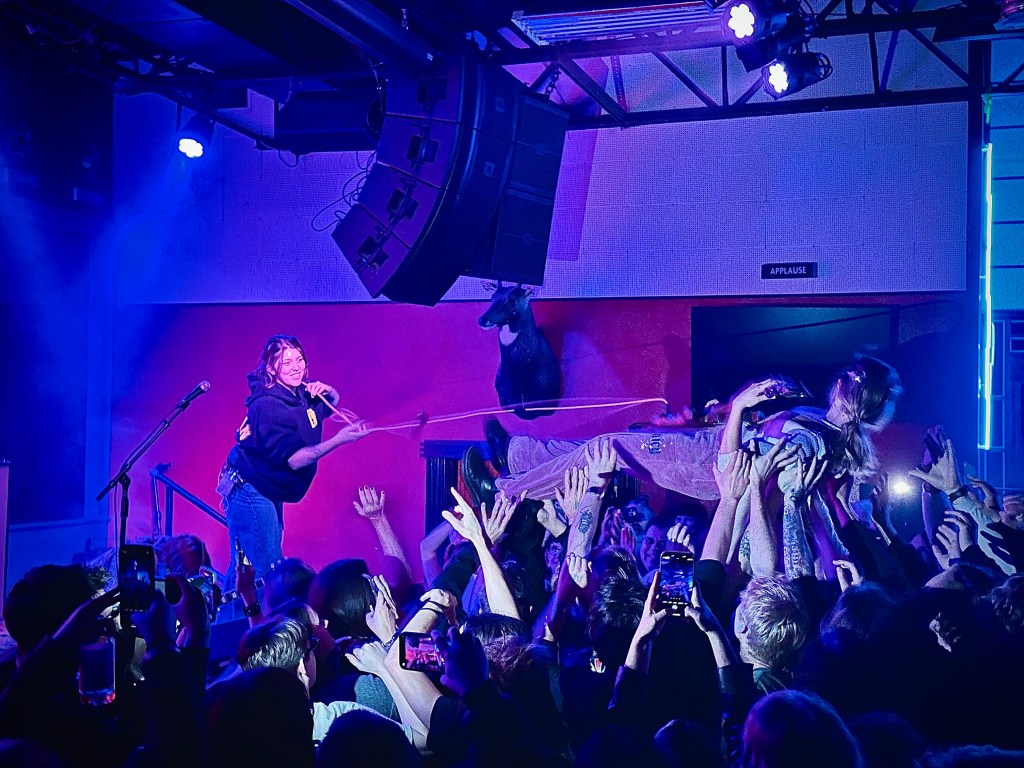 Die Spitz Bass Player Kate Halter crows surfing at The Blue Room in Nashville Tennessee