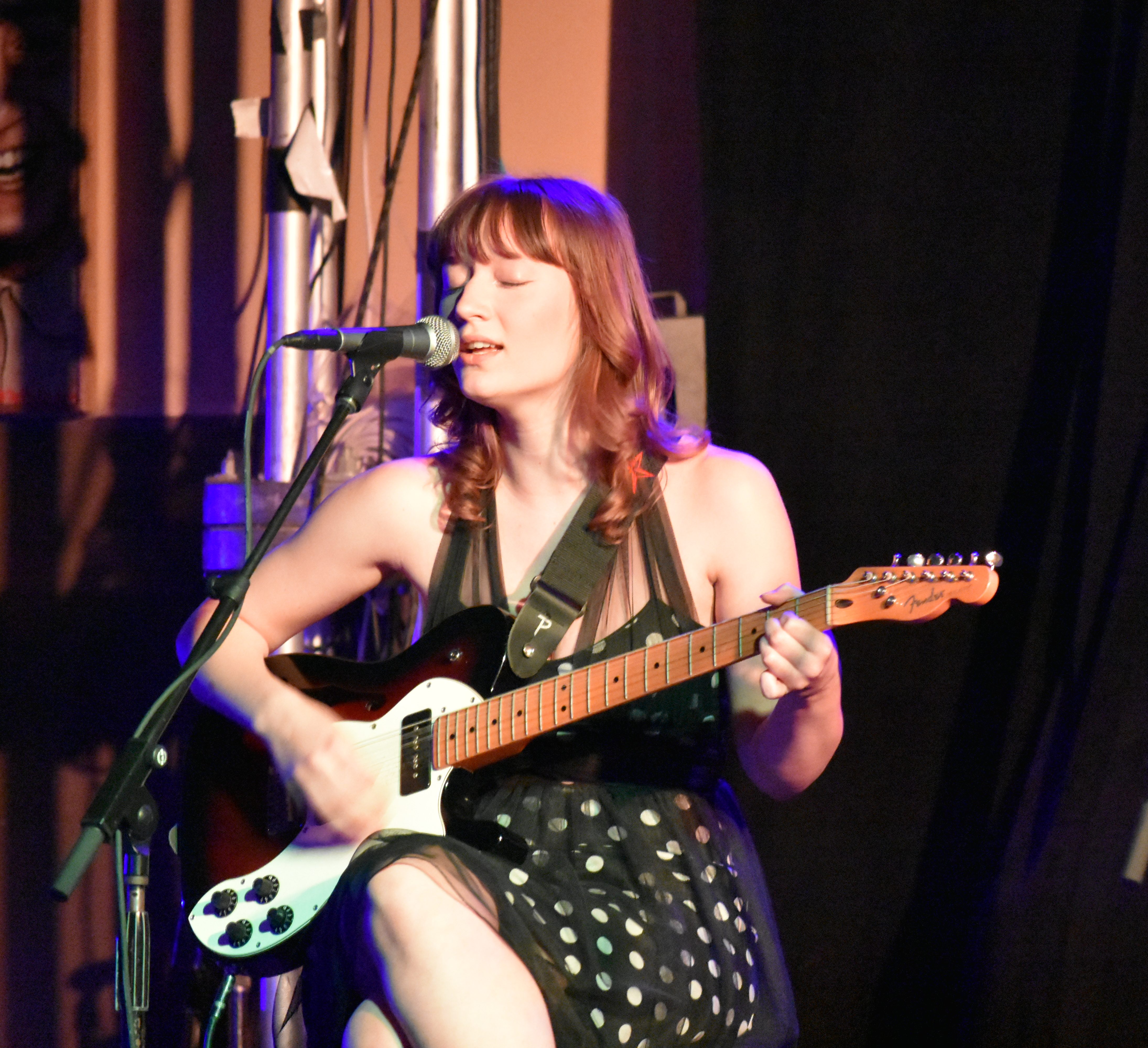 Thalia Dills performing at the 2026 Girls Write Nashville artist showcase