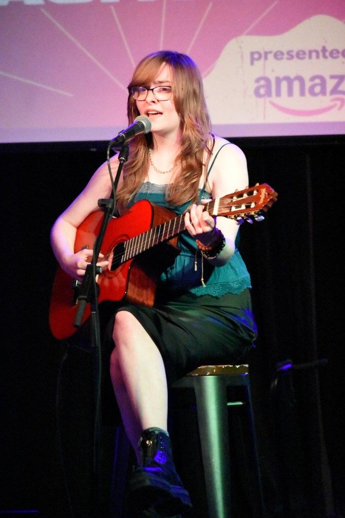 Anya performing at the 2026 Girls Write Nashville artist showcase