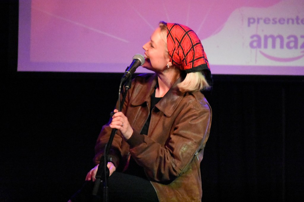 Ashe performing at the 2026 Girls Write Nashville Benefit Showcase