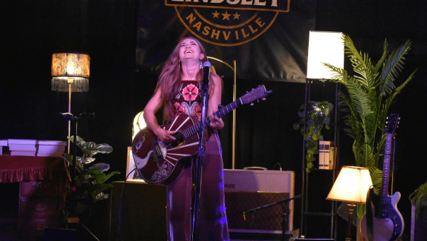 Tenille Townes singing and playing guitar in concert at 3rd and Lindsley in Nashville Tennessee