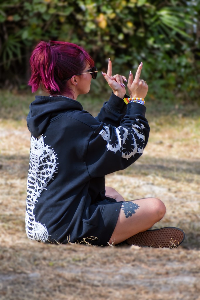 A fan watching True Loves Performing at Hulaween 2026