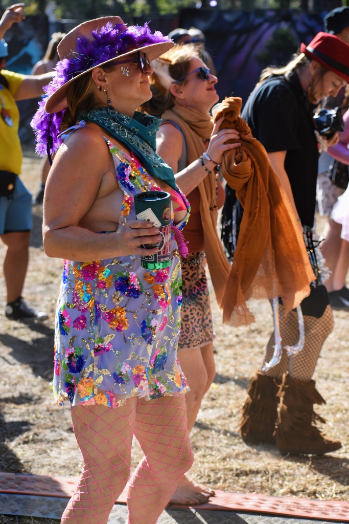 A fan dances at Tire Fire performing at Hulaween 2026