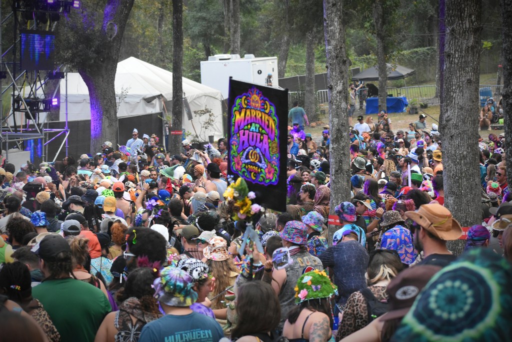 Just married sign in the crowd at Maddy O'Neal at Hulaween 2026